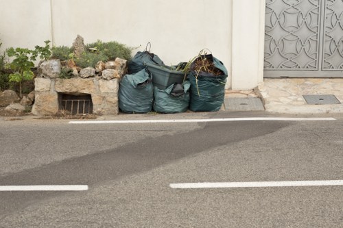 Efficient waste management practices in Raynes Park